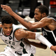 The defending champion Milwaukee Bucks taking on the Brooklyn Nets on Oct. 19.